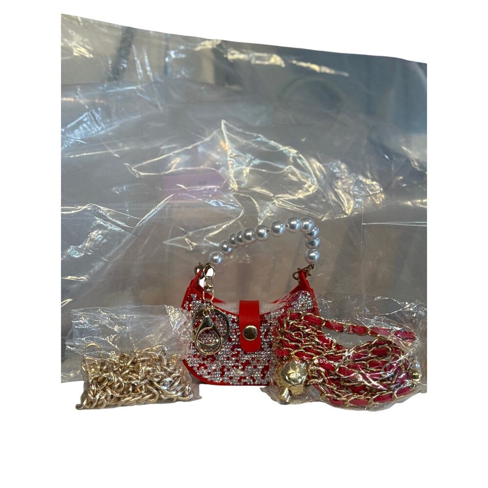 #89 Ret. $70 Red Bag Charm Blinged out, Red crossbody chain and gold acrylic